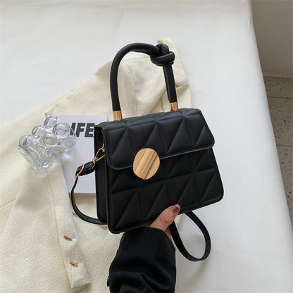 Petit sac à main femme au design géométrique