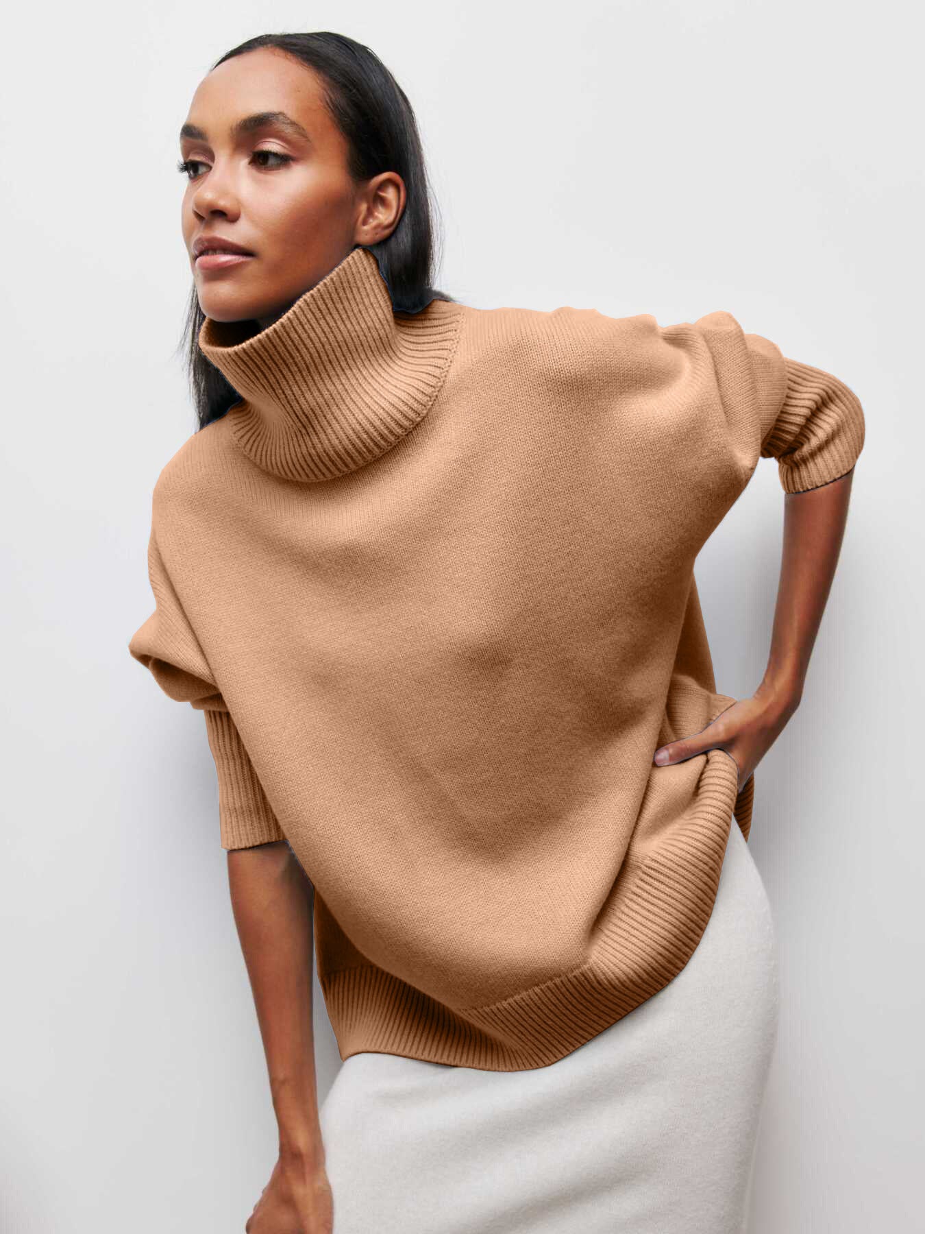 Pull d’hiver à col roulé pour femme, chaud et élégant.